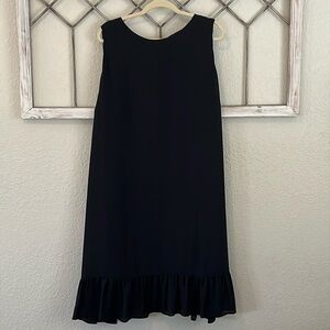 Sweet black sleeveless dress with bow tie at back neck